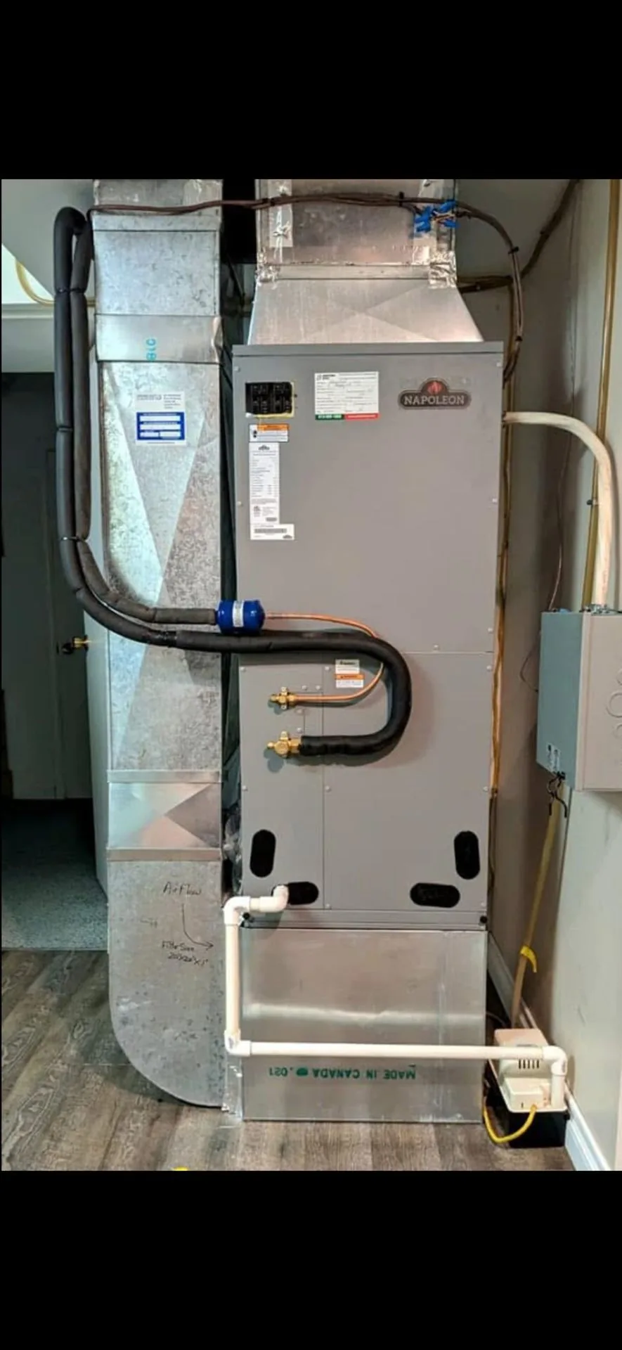 Finished HVAC ductwork and refrigerant line installation